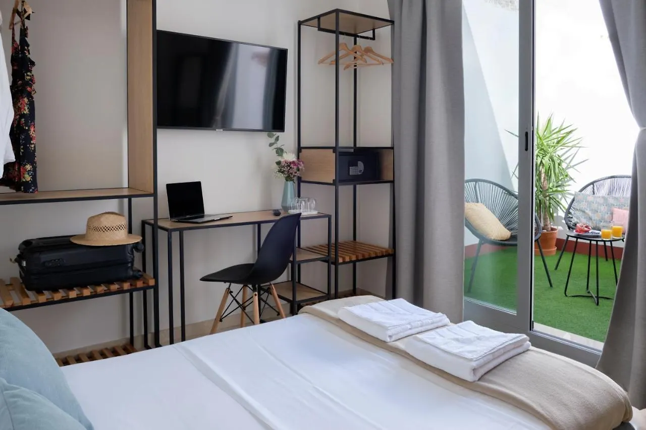 Отель Sweet Sevilla Suites